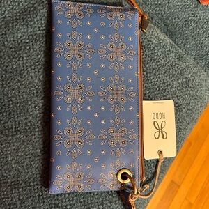Vida Wristlet
Coated Canvas Blue Journey Bandana